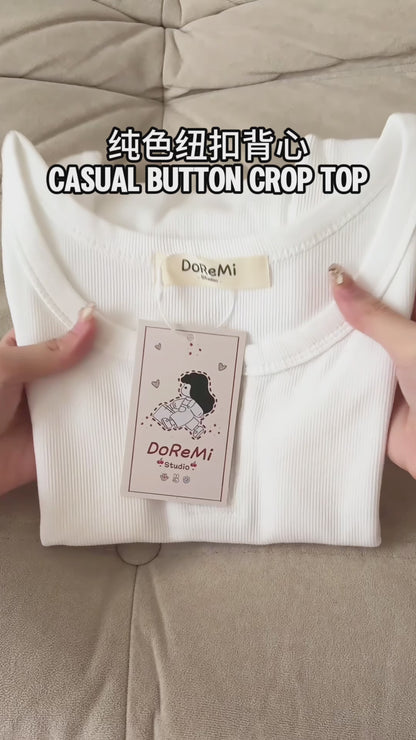 SLEEVELESS BUTTON-UP CROP TOP
